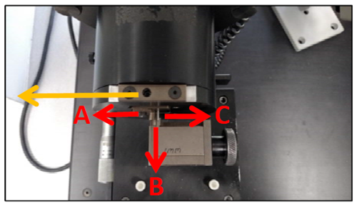 a close up of a machine that tests the bending of wire